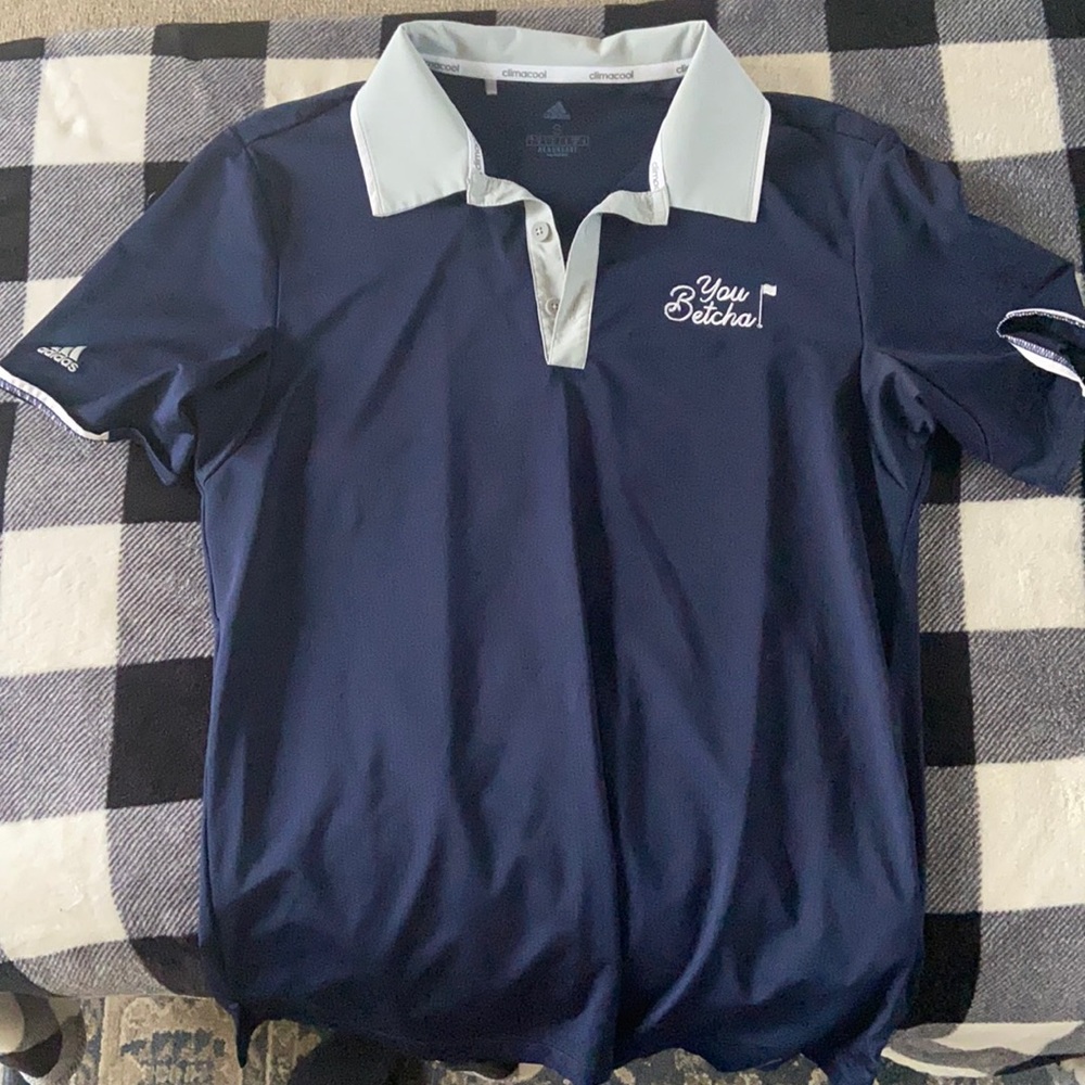 Adidas golf polo with “you betcha” golf logo